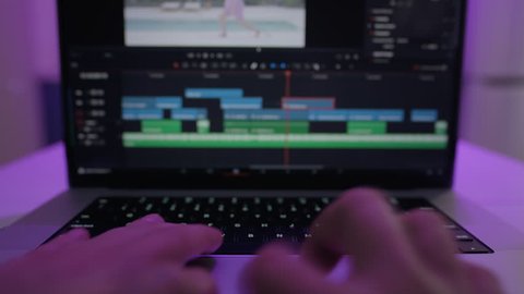 Timelapse of the editor's work on a laptop at home. Creates a creative video clip for film production. The interface of the program for video color correction. Postproduction in a home video studio Stock Video