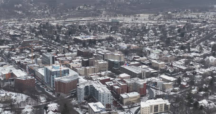 Afternoon winter aerial video of the area surrounding the City of Ithaca, NY, USA