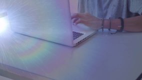 Animation of lights over caucasian teenage boy using computer. Computers, network, connections and technology concept digitally generated video. - Powered by Shutterstock - Get 15% off with code: PIKWIZARD15