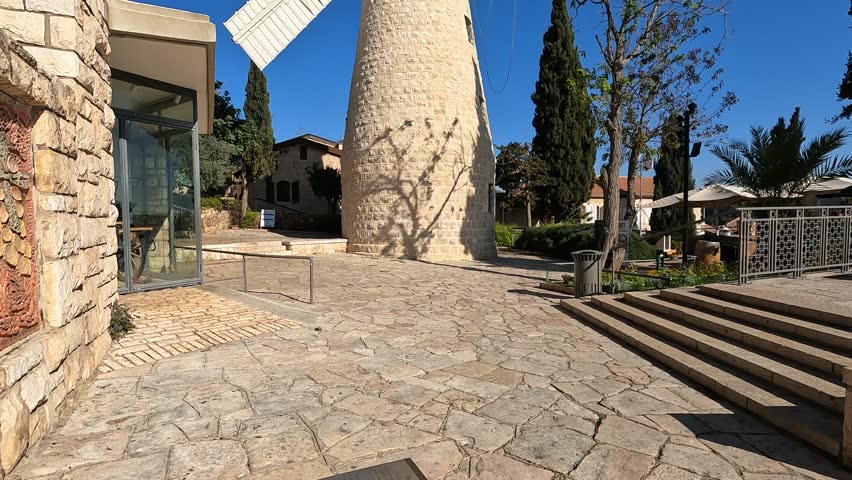 The famous and ancient windmill in the Yemin Moshe neighborhood in Jerusalem - Israel, against a clear sky