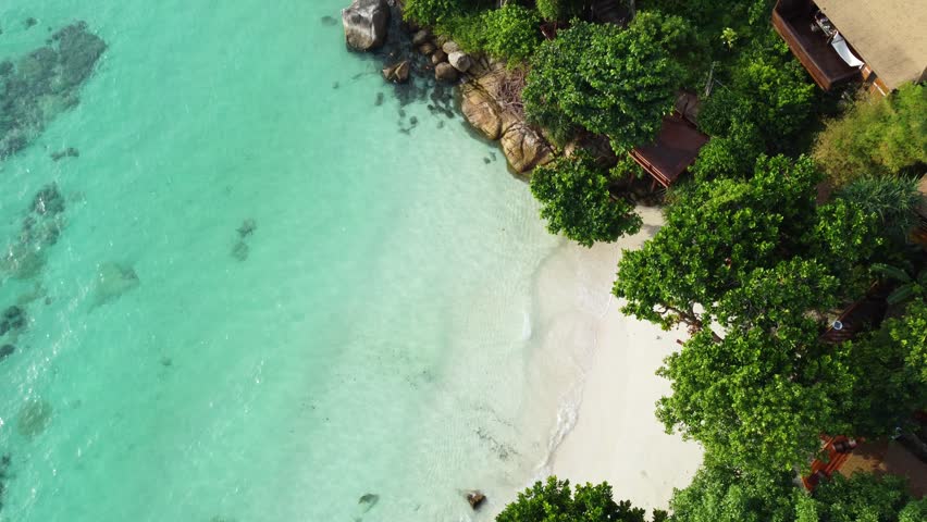 Amazing aerial view of the sandy beach in Koh Lipe island, Thailand, Asia. Tropical travel destination. Summer vibes. | Shutterstock HD Video #1099665917