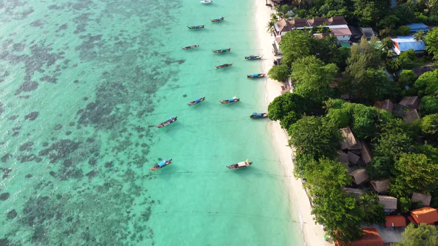 Amazing aerial view of the sandy beach in Koh Lipe island, Thailand, Asia. Tropical travel destination. Summer vibes. | Shutterstock HD Video #1099665919