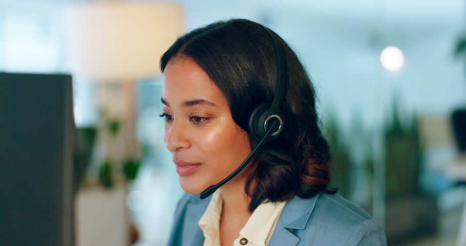 Business woman, call center and telemarketing for customer support, advice or help with headset at the office. Female employee consultant or agent talking and working on computer in online sales | Shutterstock HD Video #1099666355