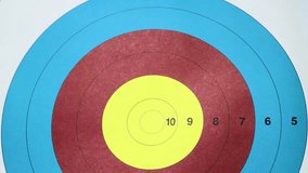 Three arrows hits on target. Ten. Close up archery video