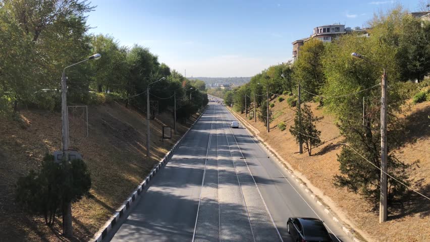 Cars drive down the street in Kharkiv, Ukraine. Streets of Kharkiv. Car traffic on Kharkiv street