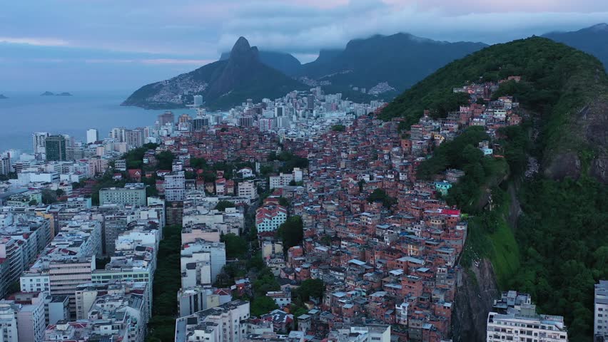 Cantagalo and Pavao-Pavaozinho Favelas. Rio de Janeiro, Brazil. Aerial View. Orbiting Royalty-Free Stock Footage #1099677795