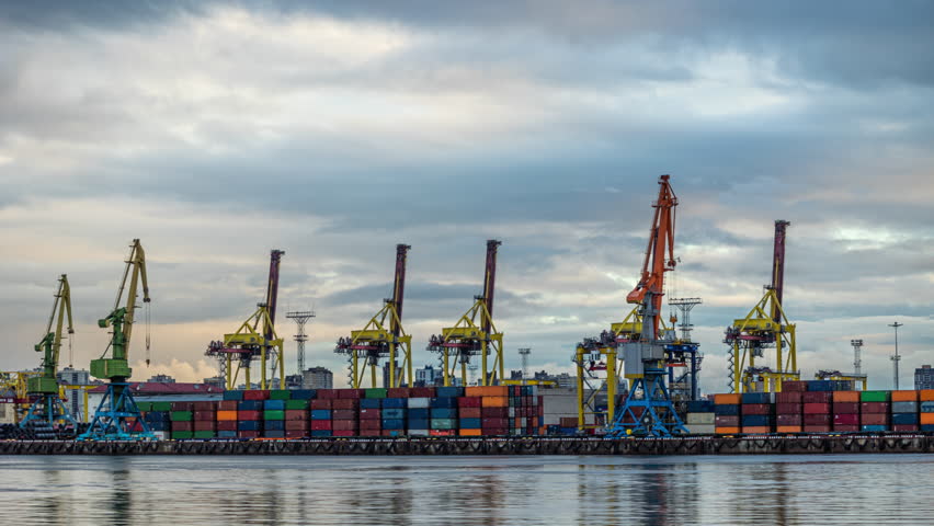 Cargo loading cranes in seaport, container transportation and cargo ships. logistics and delivery of cargo and fuel | Shutterstock HD Video #1099681531