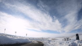 Time lapse. Driving on a rural road in American suburbs on Winter morning.