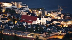 The port and downtown of Molde town at night