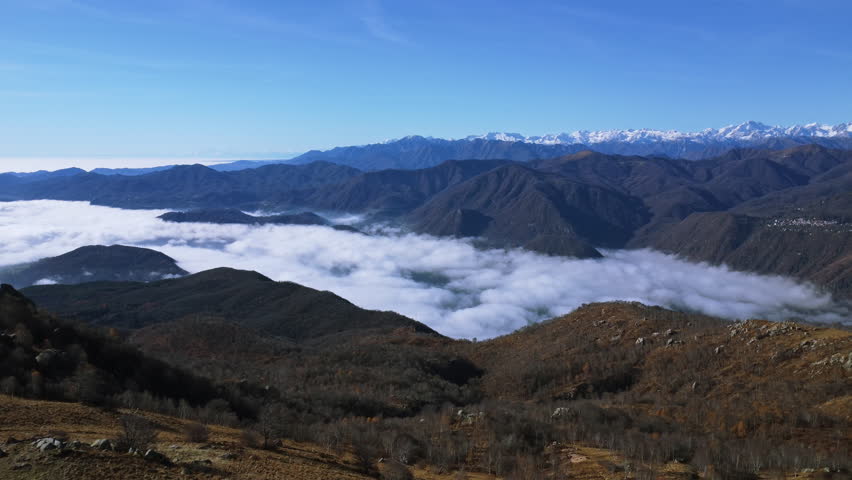 Aerial view of Orta Lake covered by clouds. Mottarone, Piedmont, Italy