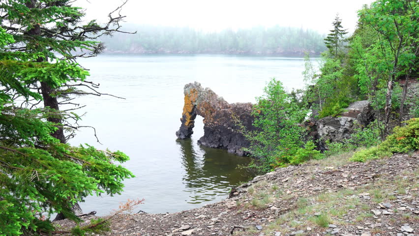 Sea Lion Rock Arch is an icon of Sleeping Giant Provincial Park, view from hiking trail in Pass Lake, Ontario, Canada