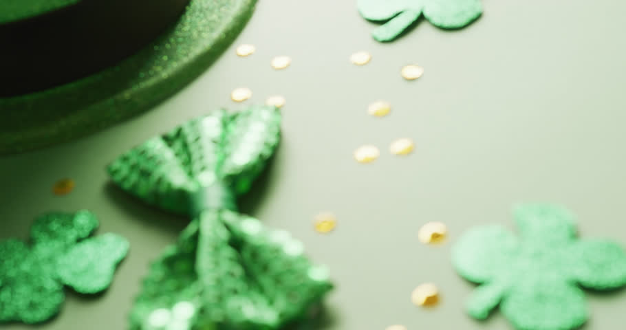 Animation of st patrick's green hat, shamrock and bow tie with copy space on green background. St patrick's day, irish tradition and celebration concept digitally generated video | Shutterstock HD Video #1099689141