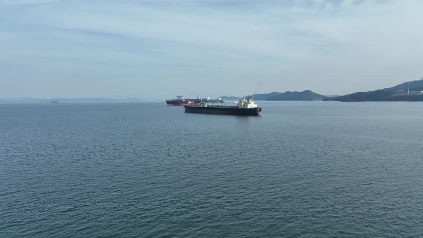 Cargo ship on the anchorage of korean port | Shutterstock HD Video #1099695207