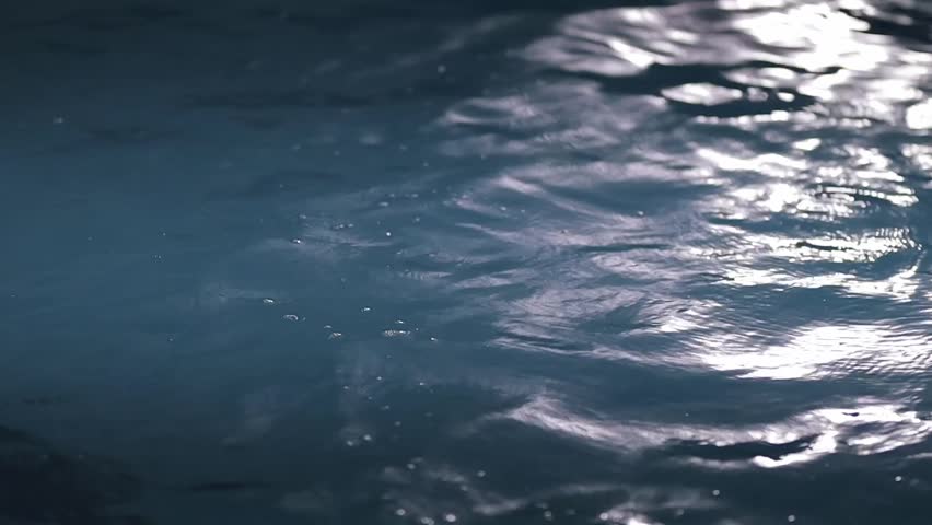 Close-up of the water in the pool, the surface of the water. refraction reflection in pool water close-up. water surface close up abstract background. a swimming pool. | Shutterstock HD Video #1099701541