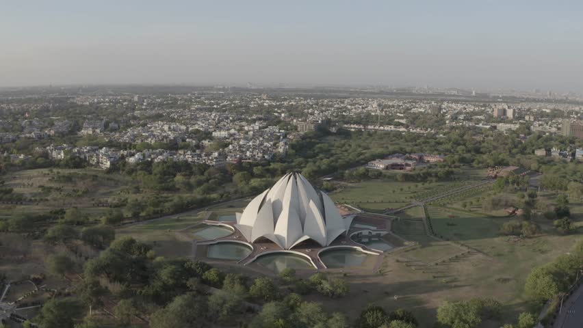 An aerial shot of the Lotus Temple during COVID-19 Lockdown in New Delhi, India
 Royalty-Free Stock Footage #1099702269