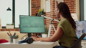 Female employee analyzing financial report on data diagrams, using online web statistics to find sales information. Woman working from home on finance marketing result. Handheld shot. - Powered by Shutterstock - Get 15% off with code: PIKWIZARD15