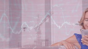 Animation of financial data processing over caucasian woman using smartphone at home. Global finance and business data technology concept - Powered by Shutterstock - Get 15% off with code: PIKWIZARD15