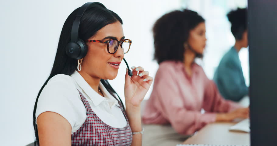 Call center woman, office and communication for customer service, help and advice by computer with team. Crm expert, consultant and contact us for customer support, consulting clients and help desk | Shutterstock HD Video #1099711815