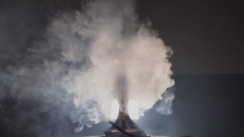 Hookah on the table and hookah in clouds of smoke. High quality Full HD video recording | Shutterstock HD Video #1099718875