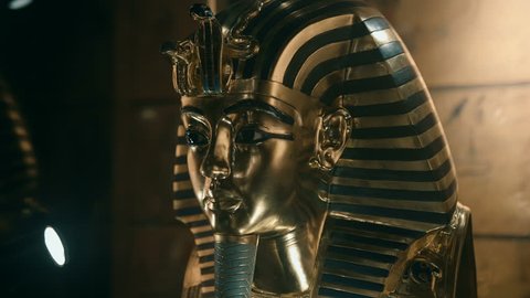 Golden Mask of Tutankhamen. Tutankhamun's famous funerary mask is one of the most recognizable Egyptian images - one of the exhibits of Tutankhamun's tomb, a symbol of Ancient Egypt. Shot in motion Adlı Stok Video