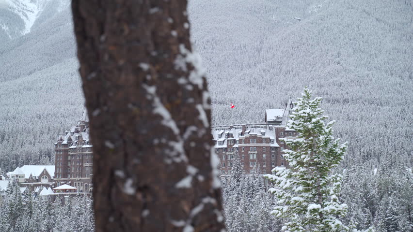 Snowy resort hotel castle in the canadian rocky mountains in Banff, Alberta.