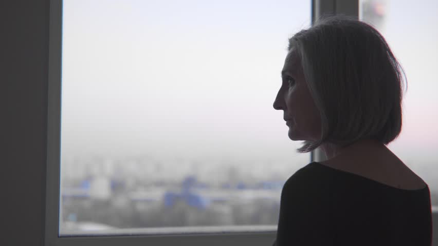 Thoughtful stylish woman looking at window, psychologist waiting for patient | Shutterstock HD Video #1099725277