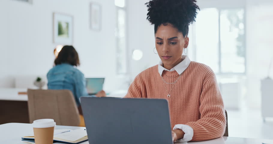 Stress, headache and burnout with a business black woman at work on a laptop in her office for a deadline. Computer, compliance and mental health with a female employee working on a company project | Shutterstock HD Video #1099726357