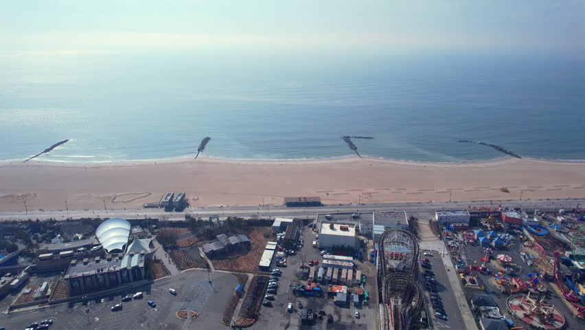 Slider Shot Of Magnificent Sandy Beach Of Coney Island, New York City | Shutterstock HD Video #1099734381