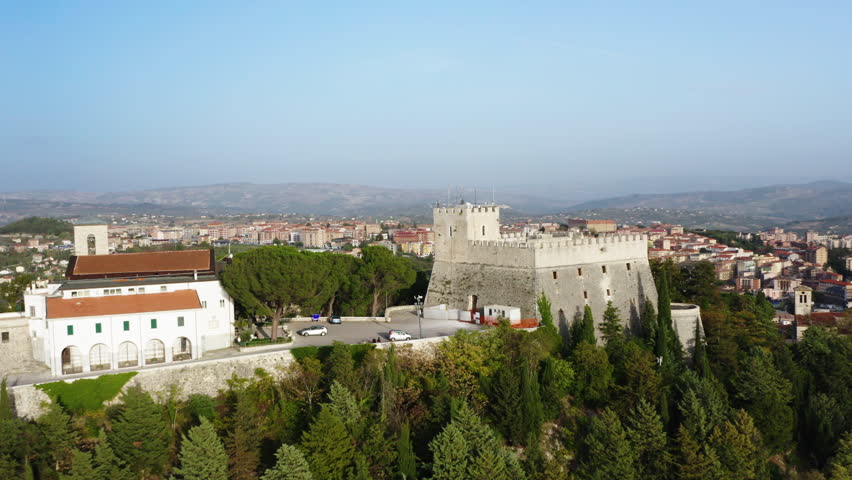 Reveal shot of Campobasso city in Molise region, flying over Monforte Castle