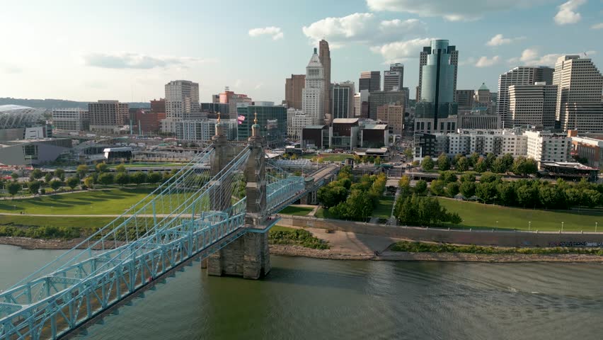 Aerial of Downton Cincinnati, Ohio with John A. Roebling Suspension Bridge over Ohio River