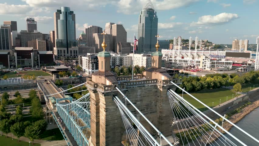 Aerial Pan of Bridge Tower with American and Ohio Flag, Cincinnati Ohio Downtown