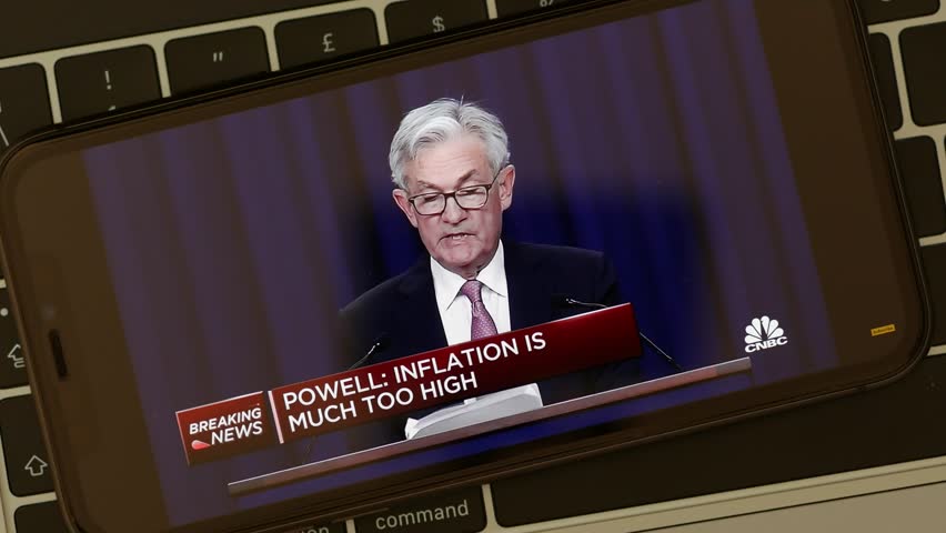MAY 4, 2022: Fed Chair Jerome Powell Talking about Inflation, Wathing the Video on CNBC Television YouTube Channel, on an iPhone