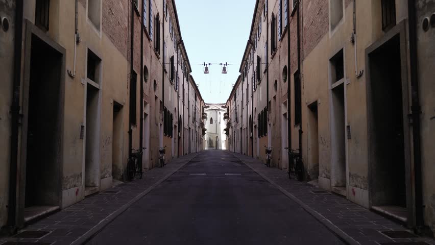 Movement on the street with old buildings