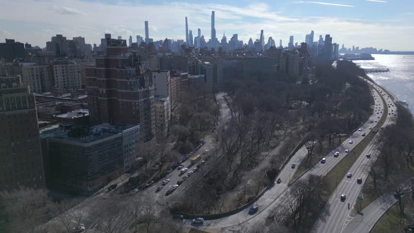 Flying south over Riverside Park on the Upper West Side of Manhattan | Shutterstock HD Video #1099753727