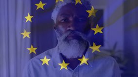 Animation of flag of eu over senior african american man. Politics and patriotism concept digitally generated video.
