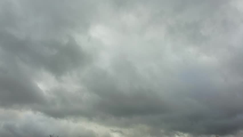 High Angle Time Lapse Footage of Storm Clouds Moving over City