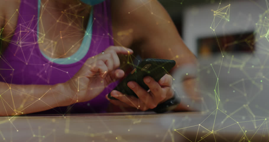 Animation of connections and data processing over woman using smartphone. Global networks, computing and data processing concept digitally generated video.
