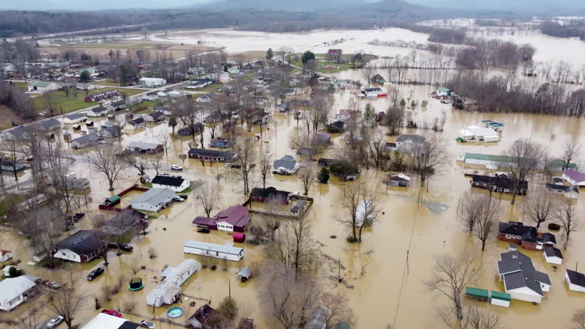 Aerial view of a flooded city, a consequence of heavy rains and climate change. Royalty-Free Stock Footage #1099763375