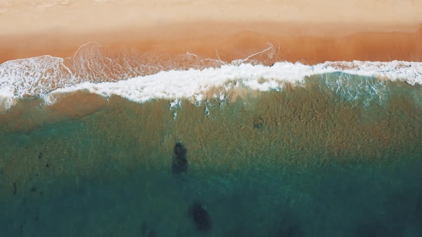 Top view of beautiful wave hitting clean beach ,side way move | Shutterstock HD Video #1099765933