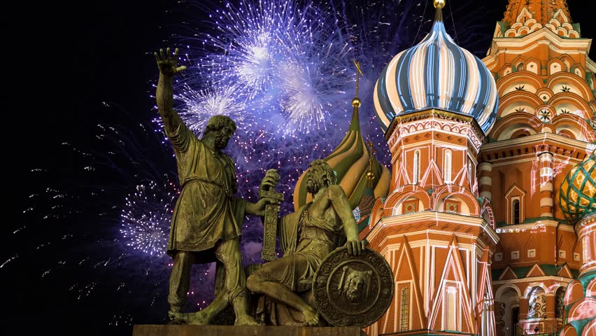 Celebratory colorful fireworks and Cathedral of Intercession of Most Holy Theotokos on the Moat ( Temple of Basil the Blessed),  Red Square, Moscow, Russia (time lapse) 