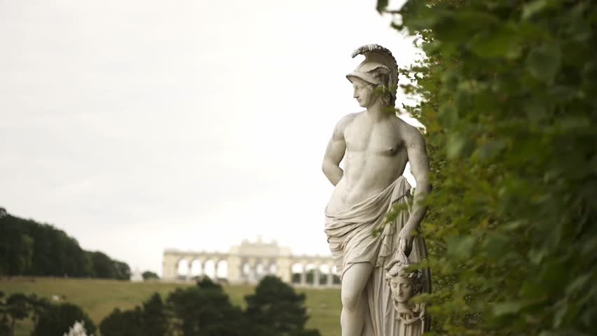 statue at Palace and Gardens of Schonbrunn. Travel destination for tourist visiting Austria. Europe summer tourism.