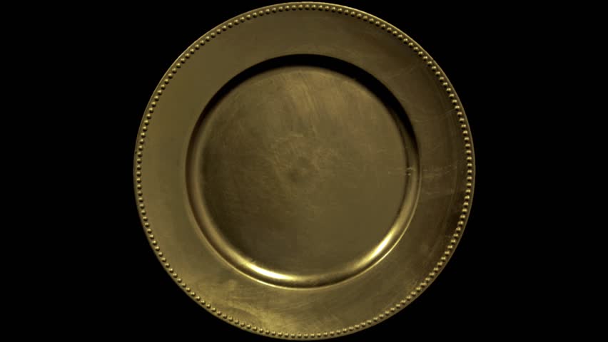 Top view on round golden plate or tray | Shutterstock HD Video #1099771173