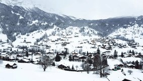Grindelwald village in Switzerland aerial drone video