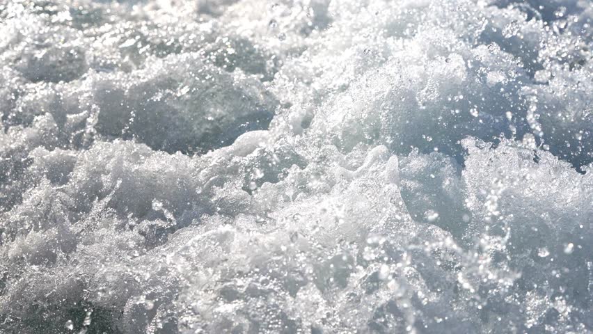 White bubble and water wave. Clean white foam splash around on the water sea. | Shutterstock HD Video #1099781671