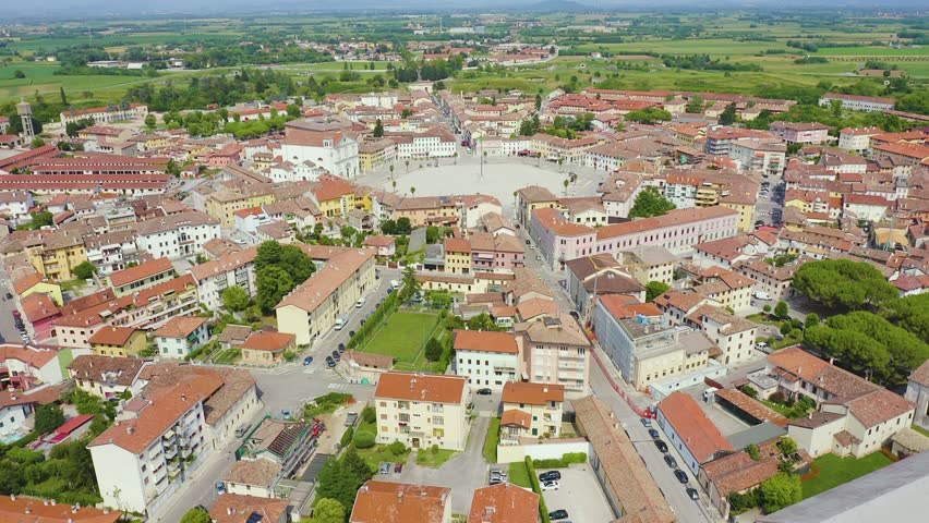 Inscription on video. Palmanova, Udine, Italy. An exemplary fortification project of its time was laid down in 1593. Blue lights form luminous. Electric style, Aerial View, Point of interest