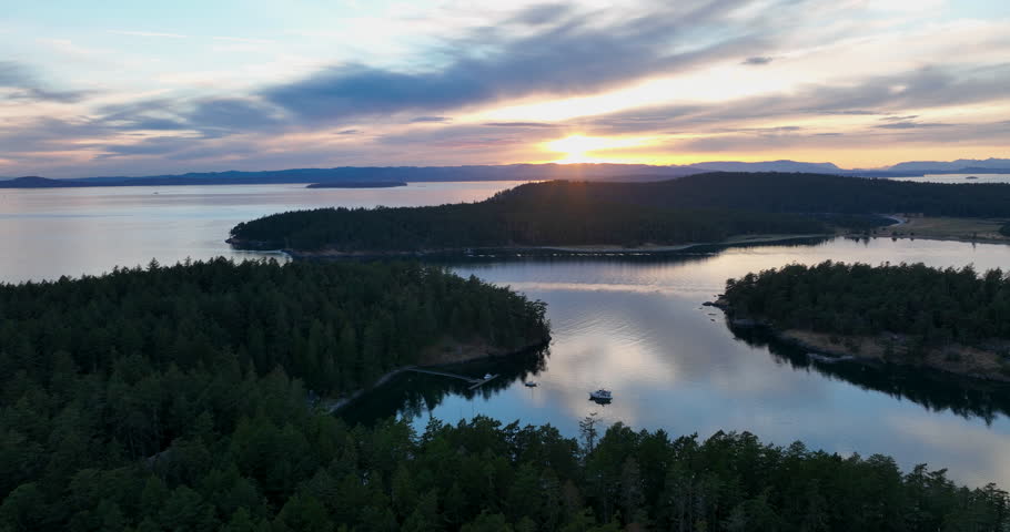 Panoramic Sunset Aerial View Calm Sea Forested Island Roche Harbor Washington USA