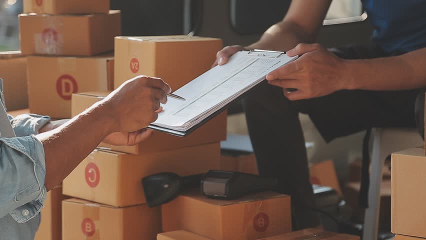 Startup happy Asian woman business owner works with a box at home, prepare parcel delivery SME supply chain, procurement, package box to deliver to customers, Online SME business entrepreneurs ideas, | Shutterstock HD Video #1099813073