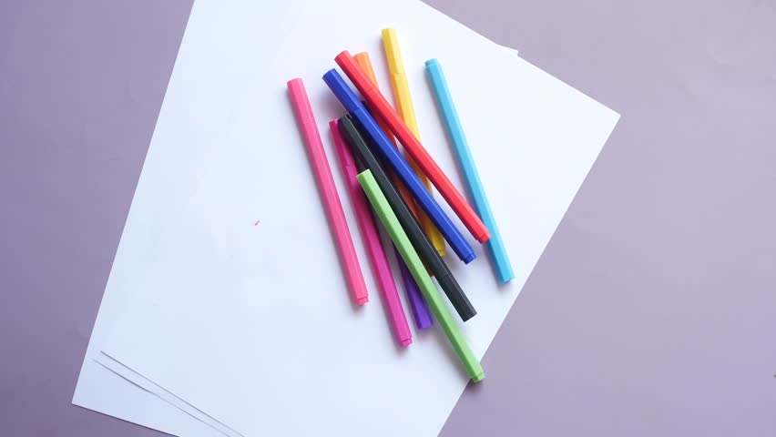 Top view of child hand pick color pencil  | Shutterstock HD Video #1099816653