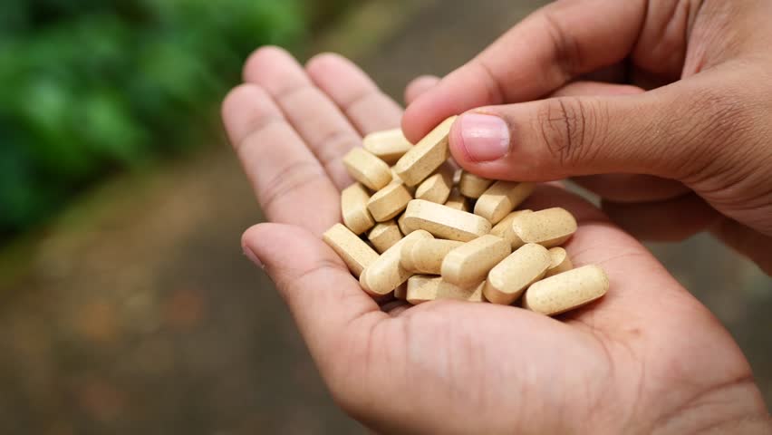  hand pick herbal medicine capsule | Shutterstock HD Video #1099816681