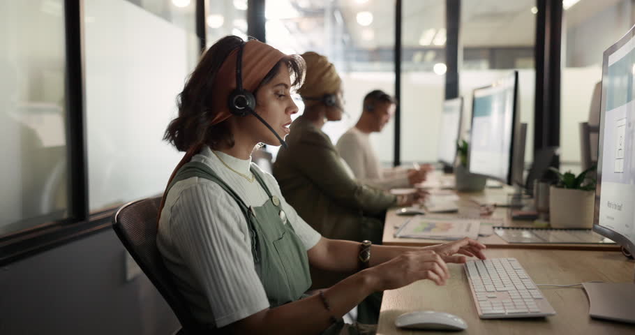 Call center, computer and consulting with business woman for telemarketing, customer service and contact us. Communication, sales and crm with girl employee at help desk agency for technical support | Shutterstock HD Video #1099826979